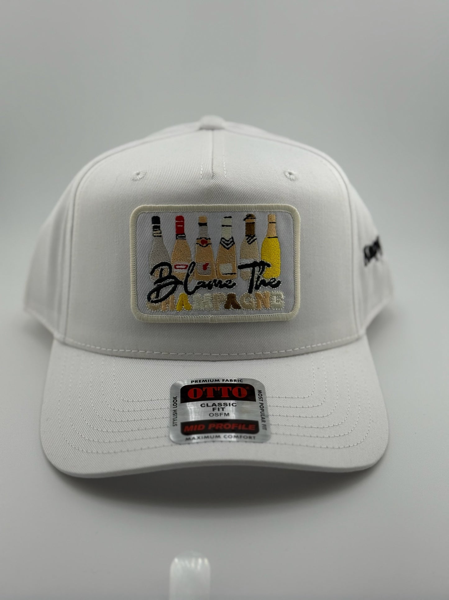 Blame the Champagne Patched Linen Trucker Hat