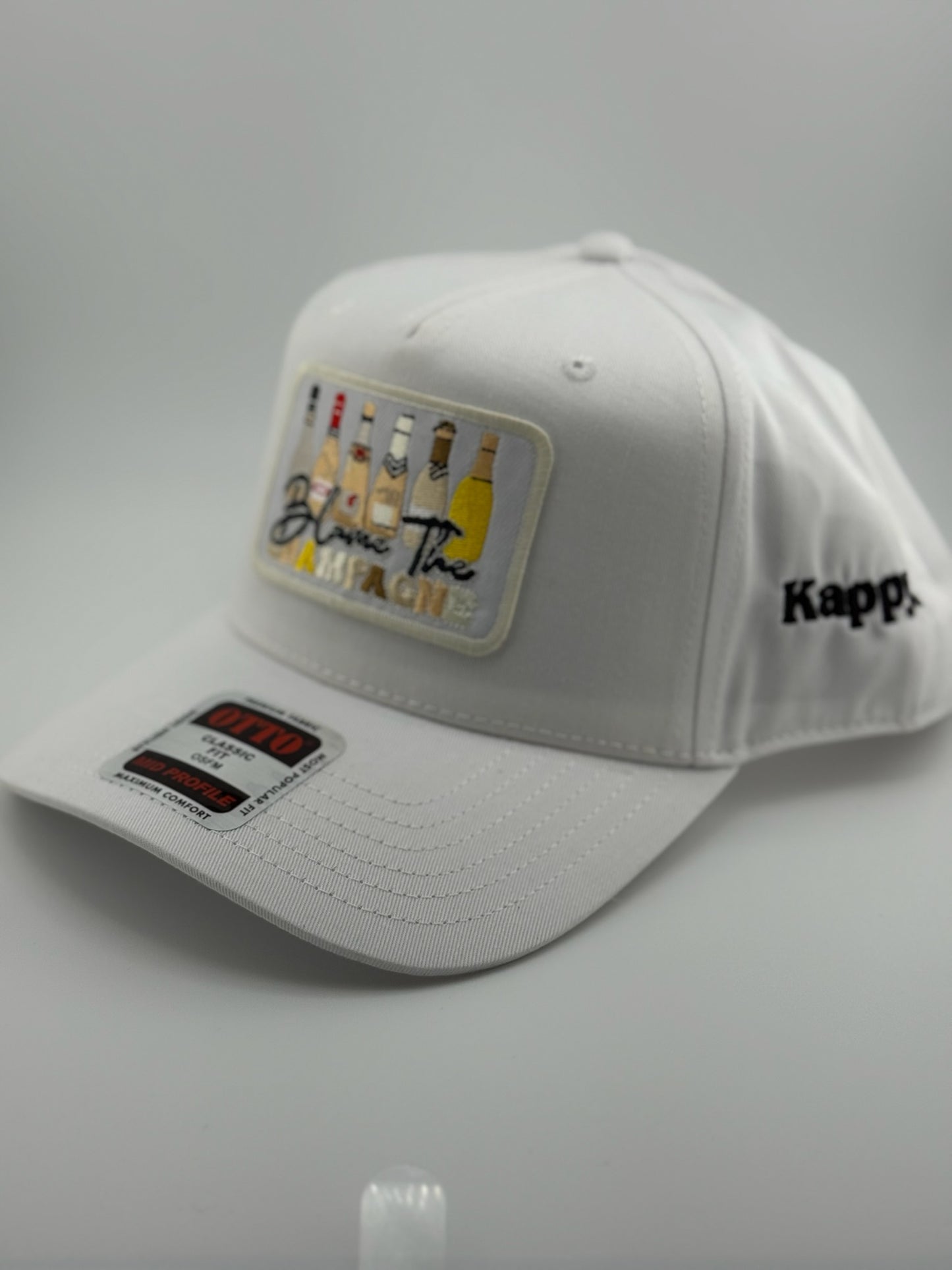 Blame the Champagne Patched Linen Trucker Hat